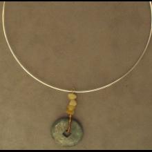 Collier avec pice en bronze